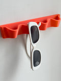 Wave sunglasses holder racK