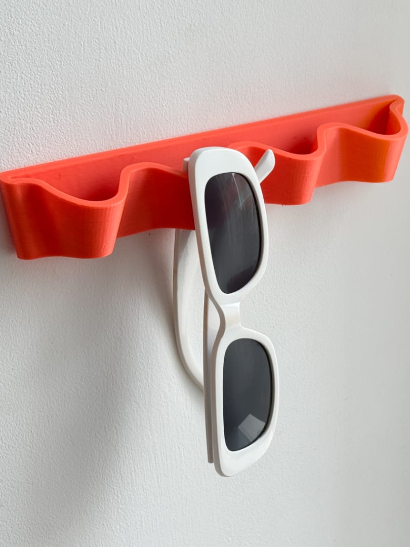 Wave sunglasses holder racK