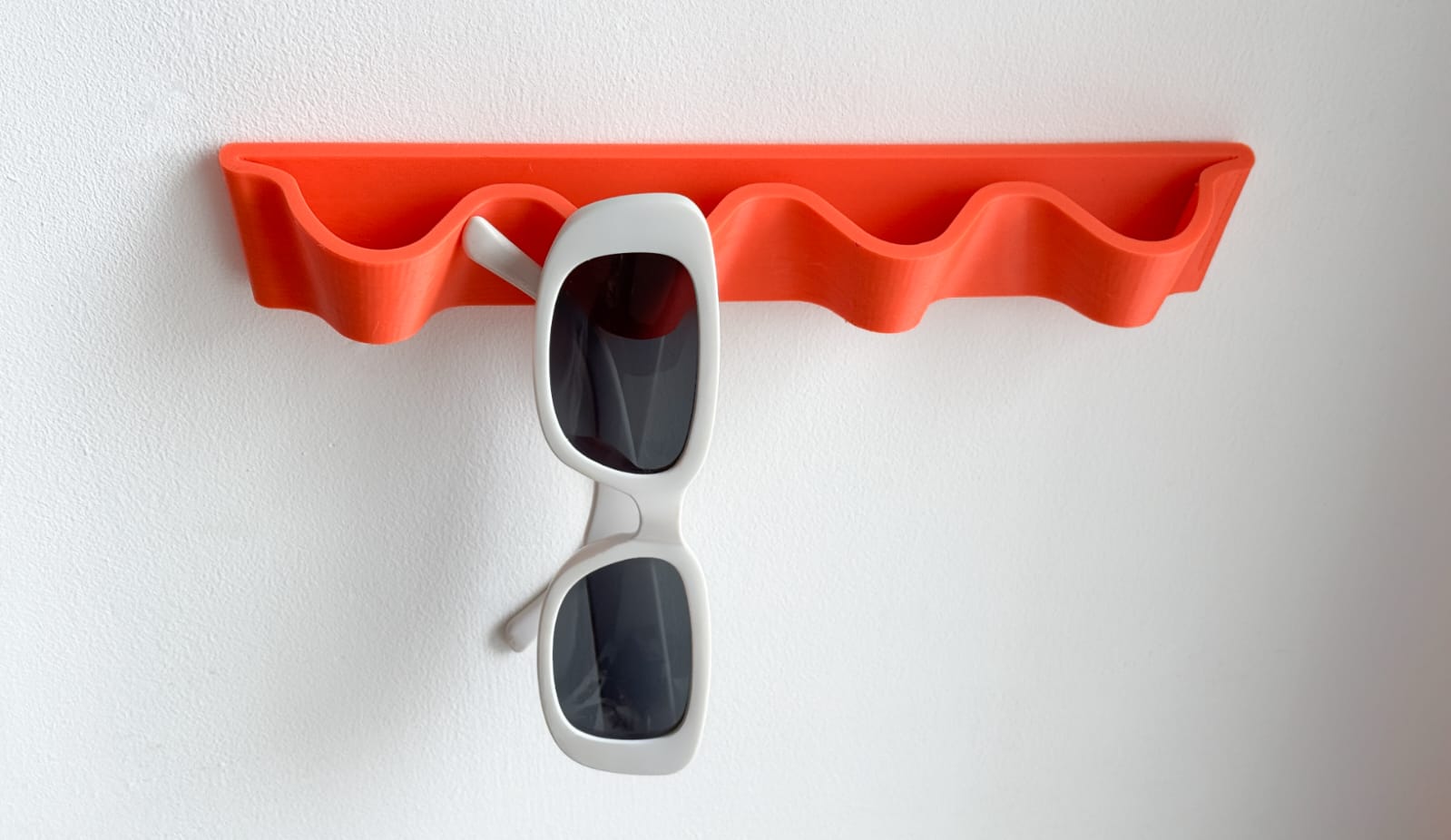 Wave sunglasses holder racK