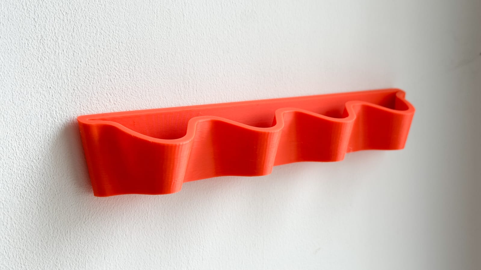 Wave sunglasses holder racK